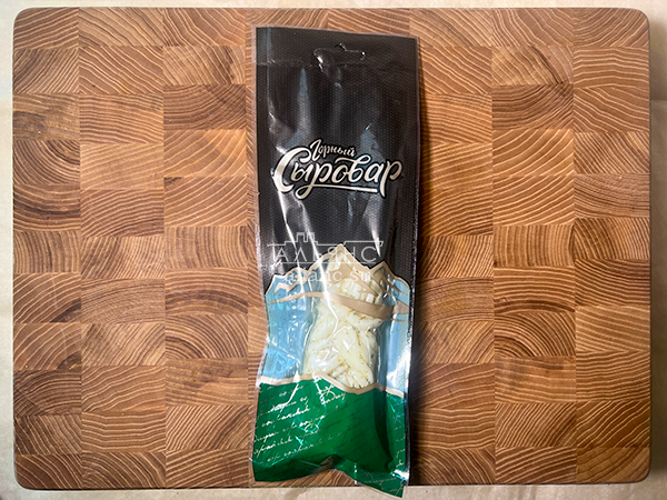 Сыр 100 гр ГОРНЫЙ СЫРОВАР (Косичка с укропом и чесноком) в Волжском